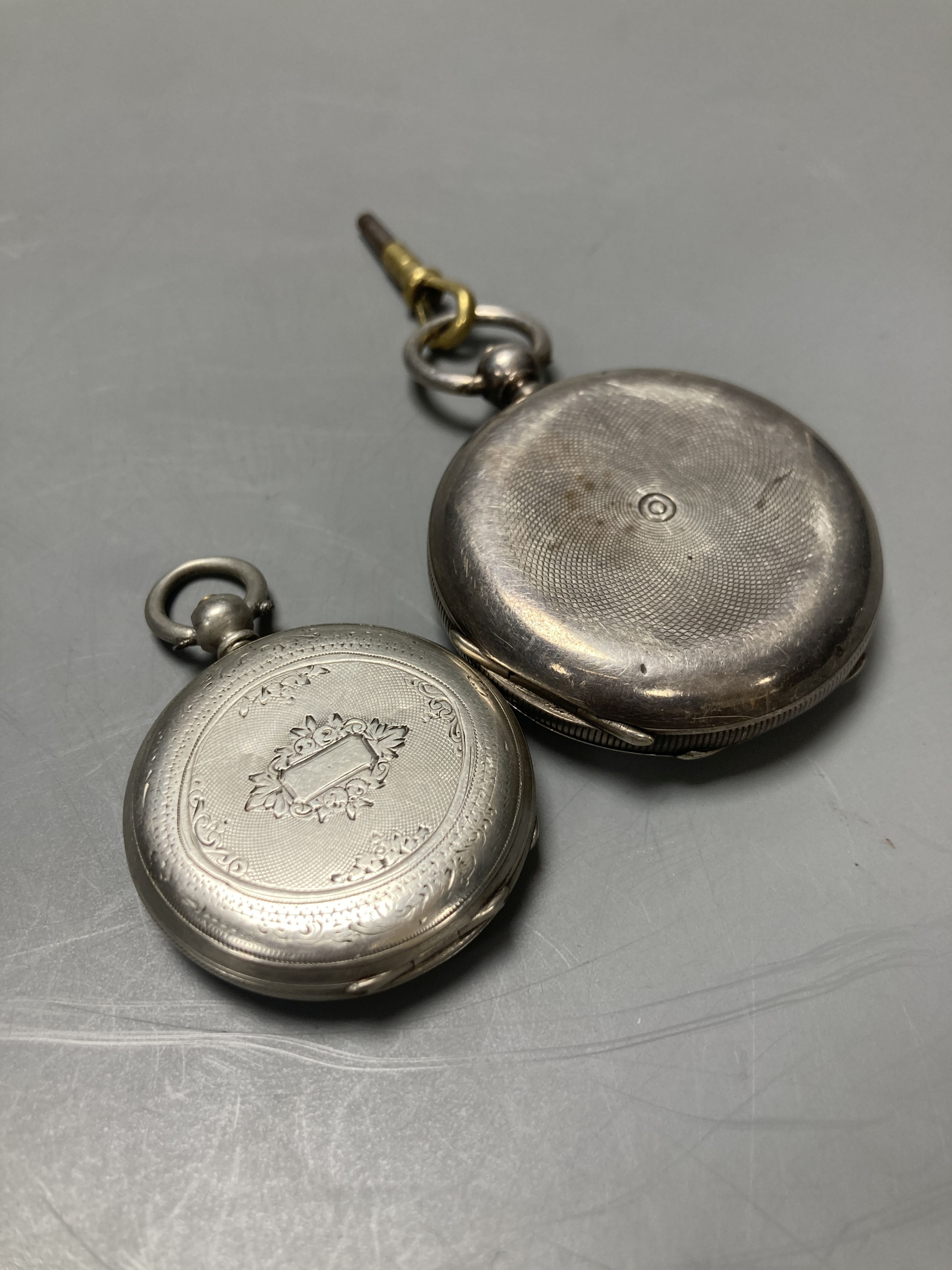 A Swiss silver keywind hunter pocket watch in J.W.Benson signed 935 standard case and a keywind fob watch.